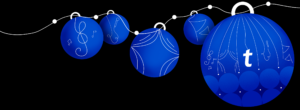 5 blåa julgranskulor med noter, flaggor, mikrofoner, stjärnor och Ticketmasters t som mönster.